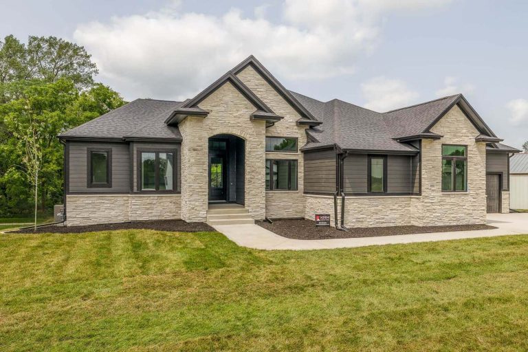 light stone and black siding