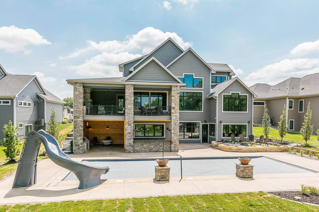 Beautiful home with a pool and slide.