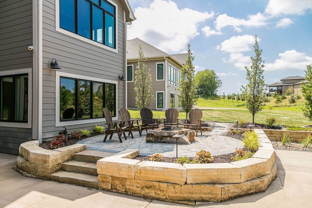 KRM's custom build back patio with a fire pit